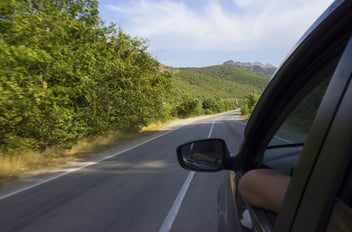 Car with automatic transmission driving on country highway