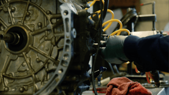 Transmission technician rebuilding a unit with an application variation